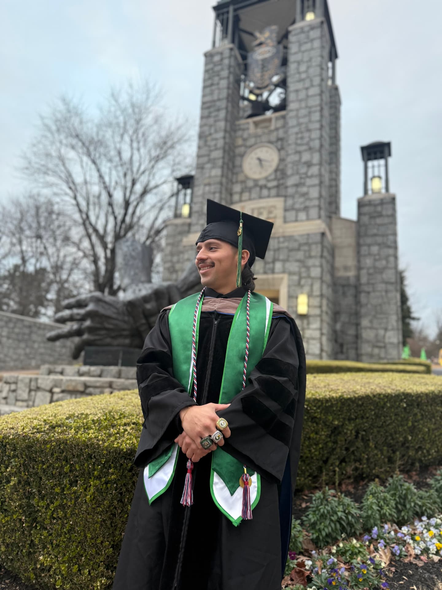 Dr. Adrian Escobedo in cap and gown at Life University graduation